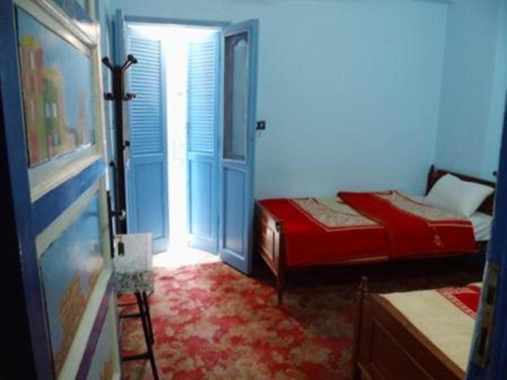 Bob Marley House Sherief Hotel Луксор Номер фото