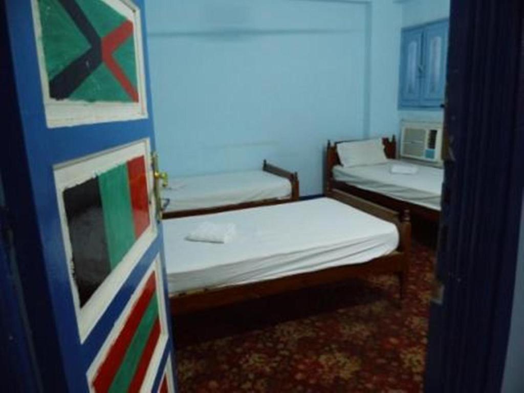 Bob Marley House Sherief Hotel Луксор Номер фото